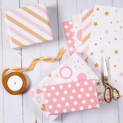 China Custom Recyclable Wholesale Custom Logo Gift Wrapping Paper Pink Printed Pink Wrapping Paper for sale