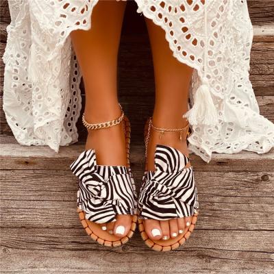 China New Summer Fashion Cheap Flat Outdoor Sandal Slippers Solid Bow Shoes With Low Top And Women Flat Heels for sale