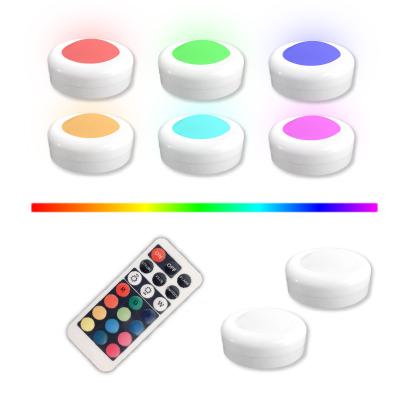 China Wall Mounted Dimmable Color Changing Light RGB Remote Control Wardroble LED Puck Light for sale