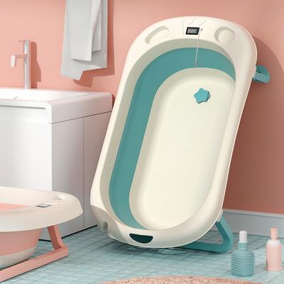 China Aricare Plastic Foldable Folding Baby Bath Tub Newborn Baby Tub Set Sets With Thermometer QC-B04 for sale