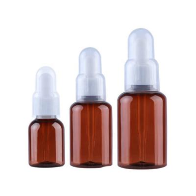 China Amber Color 25ml 35ml 50ml PET Shoulder Round Essential Oil Cosmetic Bottle Plastic Hair Oil Packaging Packaging For Cosmetic for sale