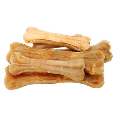 China Sustainable 100% Natural Rawhide Pressed Dog Bones Pet Dental Snacks Dog Chews for sale