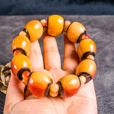 China Ethnic natural stone blood bead bracelet boutique material hand strings bone spacer beads jewelry bracelet for sale