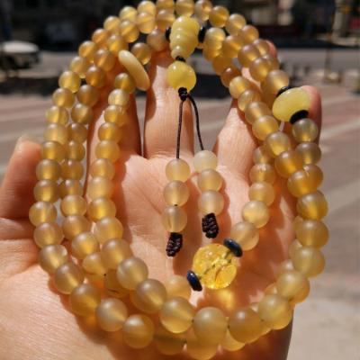 China Natural transparent religious goat horn, Buddha beads, Tibetan rosary, game bracelet for sale