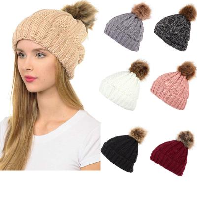 China JOINT Hot Selling Knitted Women's Winter Hats Plush Pompom Artificial Winter Hat For Women for sale