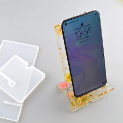 China DIY DIY Crystal Epoxy Resin Mold Simple Mobile Phone Holder Decoration Simple Universal Swing Table Silicone Mold for sale