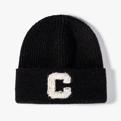 China JOINT Custom Warm Acrylic Knitted Empty Hat Women's Winter Beanie Cap Custom Logo for sale