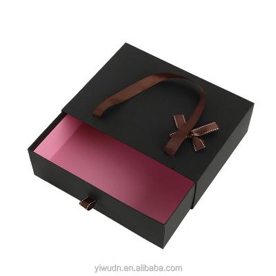 China Recycled materials luxury custom cardboard black gift box for skin care products with logo and flowers for sale