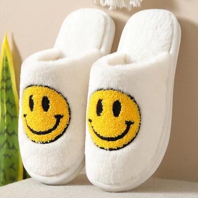 China Women's Smile Face Home Slippers Slip On Warm Plush Niggly Slipper Smile Bedroom Narrow Toe for sale