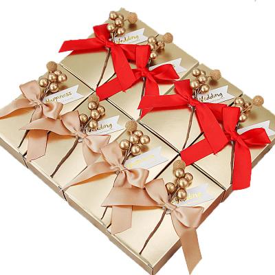 China Recycled Materials European Bowknot Candy Boxes Favor Gift Sweet Gold Handmade Boxes Packaging Bag Boxes Baby Shower Wedding Party Decoration for sale