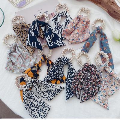 China Fashion Hot Sale Scarf Ribbon Pearl Bow Scrunchies Flower Pattern Silk Hair Gather Hair Rope For Women Girls Ponytail Holders for sale