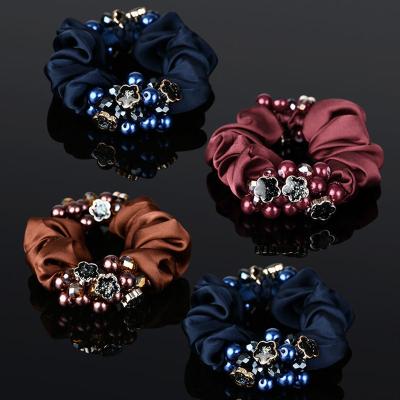 China Hot Selling High Quality Silk Hair Decoration Scrunchies Hand Wrap Pearl Beads Elastic Hair Bands For Girls Ponytail Holder for sale