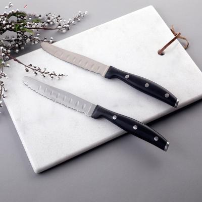 China Disposable stainless steel steak knife with serration blade and POM handle for best quality for sale