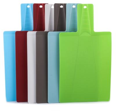 China Sustainable Shovel Shape Fruit Vegetable Chopper Fold Folding Plastic Cutting Board for sale