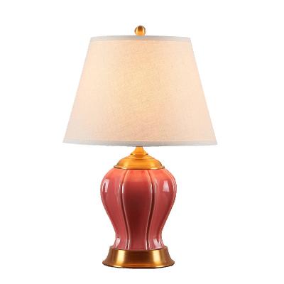 China Chinese Style 2022 Red Porcelain Lamp Copper Modern Low Modern Bedroom Bedside Ceramic Table Lamp for sale