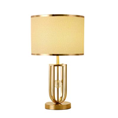 China Nordic modern hot sale wrought iron hotel living room study decoration Eurasian gold led table lamp for sale