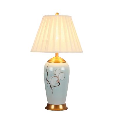 China Chinese style table lamp home bedroom living room study fabric lampshade ceramic table lamp for sale