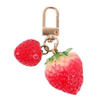 China Creative Red Fairy Bell Bag Gift INSTAGRAM Key Chain Fasion Strawberry Belle Dangling Key Chain for sale