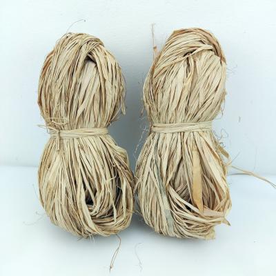 China Degradable and Waterproof Natural Raffia Ribbon for Gift Wrap Florist Bouquets Decoration Ties Papers Box Filler Packaging for sale