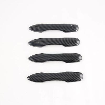 China Carbon Decorative Car Accessories ABS Exterior Door Handle Cover Trims For Toyota Camry FrontLander Cross Corolla Harrier for sale