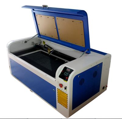 China CO2 CNC Laser Engraving Machine For Acrylic Leather Wood Glass Crystal Metal for sale