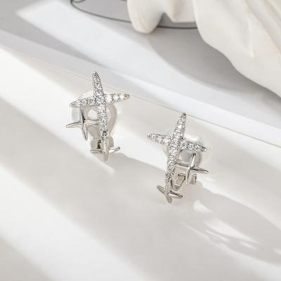 China New career maxim shiny zircon star ear clip women's office/sense small, simple and high-end eight-pointed ear piercing earrings for sale