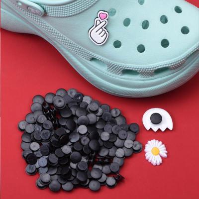 China Wholesale Stock 12mm Croc Shoe Buckle Soft Black Button PVC Shoe Buckle Low Price Shoes Accessories Charms For Croc Decor for sale