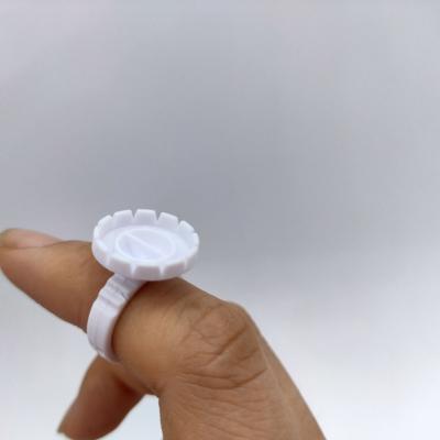 China Convenient Eyelash Glue Ring Easy Fan Adhesive Cup Blooming Eyelashes Stick Holder Rings for sale