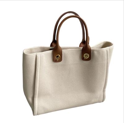 China Newspaper Used Multi Use Cotton Canvas Tote Bag Chain Shoulder Handbag Ladies High Quality for sale