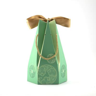 China Recyclable Creative Hexagon Zongzi Paper Box Wedding Candy Chocolate Packaging Gift Box With Ribbon Decoration for sale