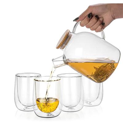 China Sustainable Hot Sale 1000ml 1600ml Shaped Glass Water Coffee Pitcher With Lid And Handle for sale