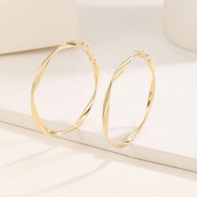 China TRENDY Elegant Copper Alloy Silver Brass Twist Color Gold Circle Hoop Earrings Fashion Round Hoop Earrings For Party Girls for sale