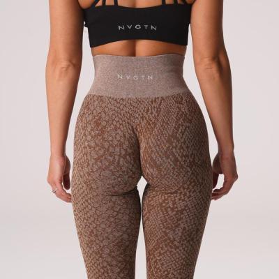 China New Arrival NVGTN Women High Waisted Yoga Pants Wholesale Custom Activewear Mocha Seamless Snakeskin Cuffs for sale