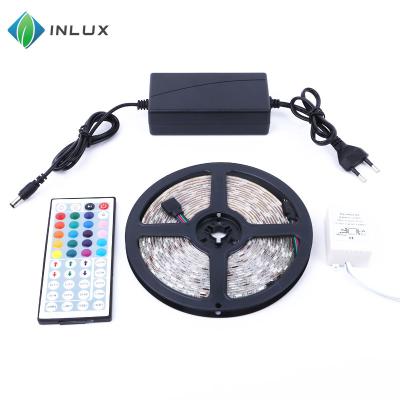 China 5 meter waterproof flexible color changing rgb smd5050 300 leds led strip kit with 44 key remote control and 12v 5a power supply for sale