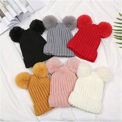 China 2019 Warm Feeling Soft Girls Boys Girls Winter Knit Solid Warm Cute Beanie Hat Balls Furry Pompom Hat Lovely Gifts R0833 for sale