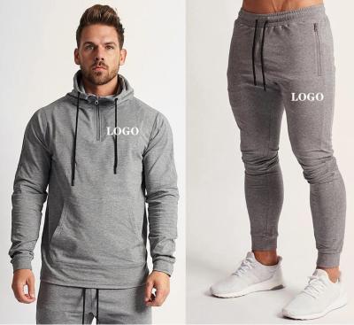 China Dropshipping Custom Fitness GYM Logo Polyester Quick Dry Running Vedo Antibacterial Tracksuit Jogging Pants 2PCS Set Men's Tracksuits for sale