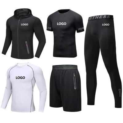 China Vedo Breathable Compression Shirt Sportswear With Pocket Set Wholesale Custom Logo GYM Compression Shirt Sportsuit Shorts 5PCS for sale