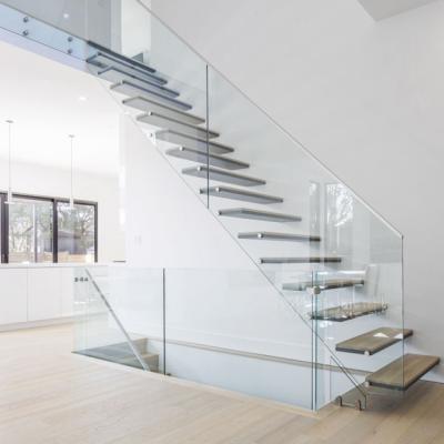 China Contemporary Frameless Glass Balustrade Floating Staircase With Hidden Stringer Tread Wood Staircase Patterns for sale