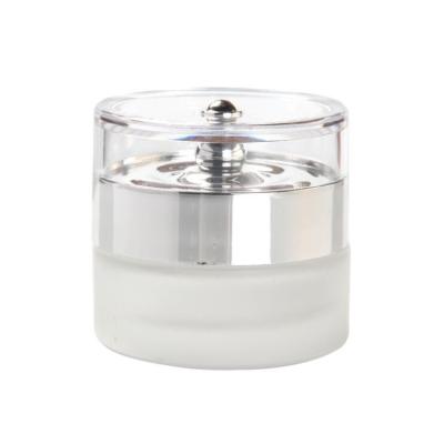 China 20g 30g 50g Cosmetic Clear Frosted Glass Cosmetic Jars With Silver Lid For Skin Care Cream for sale