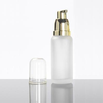 China High Quality 40ml Cosmetic Skin Care Frosted Glass Lotion Pump Bottle With Transparent Cap for sale