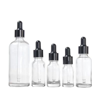 China Low MOQ Recyclable Black Rubber Glass Essential Oil Dropper Bottles 5ml 10ml 15ml 20ml 30ml for sale