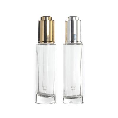 China 30ml Cylinder Cosmetic Clear Glass Serum Dropper Bottle High Quality Recyclable Eco - Friendly for sale