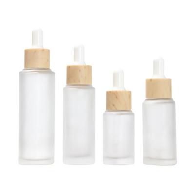 China 20ML 25ML 30ML 50ML Cosmetic Dropper Cosmetic Glass Bottles For Essential Oil for sale