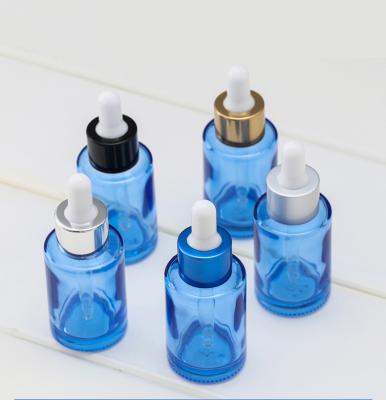 China Luxury Cosmetic Sapphire Blue Transparent Glass Dropper Bottles For Essential Oil for sale