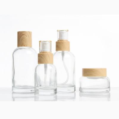 China Cosmetics Cosmetics Packaging Travel Set Toner Water Spray Cap Inner Bottle Clear Glass Cream Bottle for sale