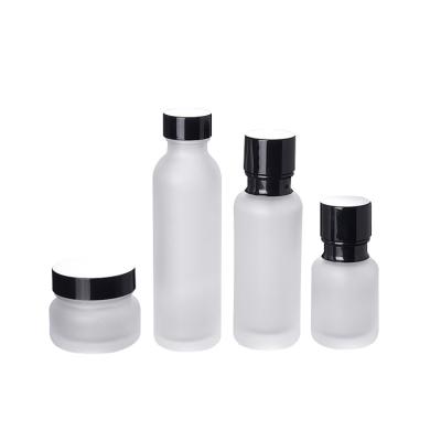 China Cosmetic LOW MOQ 50ml 100ml 150ml Frosted Glass Cosmetic Packaging Bottles for sale