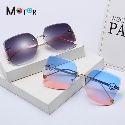 China 2021 Rimless Lightweight Rimless F02 Korean Style Sunglasses Metal Arm Resin Lens Eye Use Sun Glasses For Women for sale