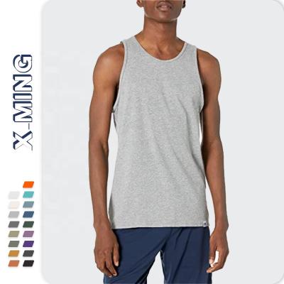 China QUICK DRY wholesale cheap fitness brand sleeveless vest logo tee vest printing o neck leisure men plus size outer blanks custom for sale