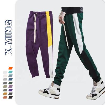 China Custom Logo Embroidered QUICK DRY Wholesale Casual Pants Patchwork Men Trouser Pants Custom Loose Drawstring Mens Sweatpants Hip Hop for sale