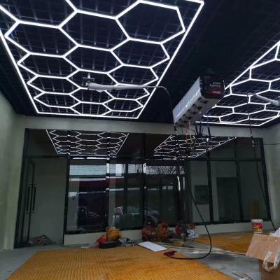 China 220V Aluminum Plastic Car Shop Ceiling Detailing Hexagon Led Lamp Honeycomb Shape Light Light for sale